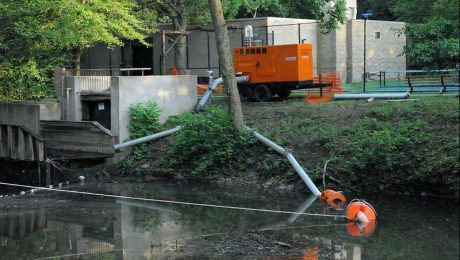 Water pump setup by calm waters.