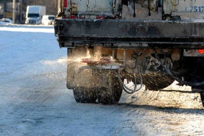Spreading Salt on Snow Covered Roadways