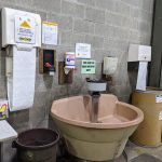 A foot operated multi-use hand washing station is installed in the shop allowing for multiple employees to wash at the same time in an effort to conserve water.