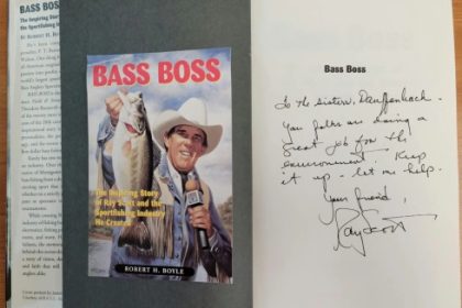 Autographed copy of Ray Scott's Bass Boss Book.