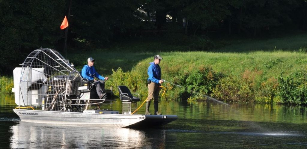 Aquatic herbicide treatment of a lake.